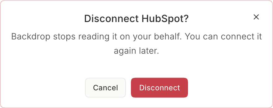 The Disconnect HubSpot? dialog: Backdrop stops reading it on your behalf, with Cancel and Disconnect buttons